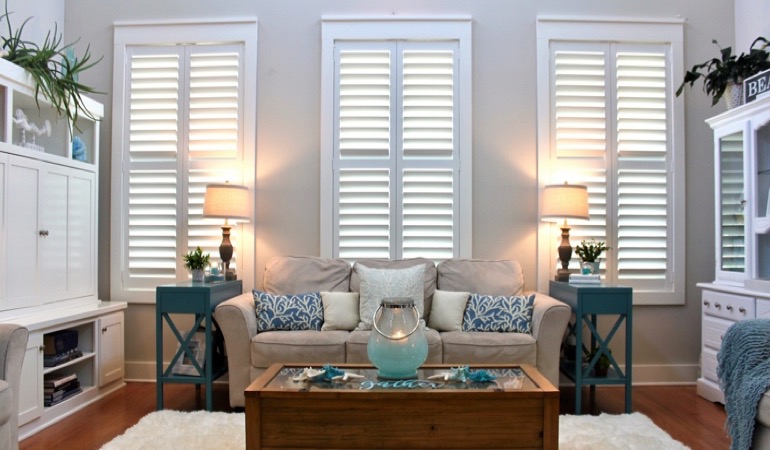 Gainesville modern sunroom with white shutters 